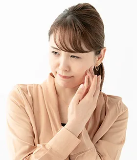 顎関節症の女性